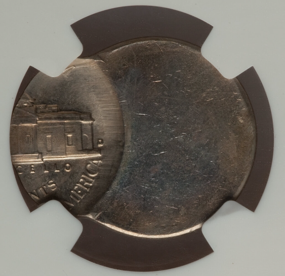 1969 nickel off-center strike error showing the design shifted approximately 20-30 percent off center with full date visible